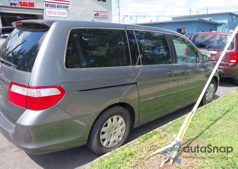 2007 Honda Odyssey Lx z USA, uszkodzony, nr VIN 5FNRL38227B118455